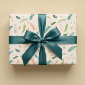 Cream background scattered with hand-drawn styled leaves in multiple colors including forest green, teal, light green, orange, and blue. Leaves vary in size and are positioned at different angles throughout. Multiple placeholder text elements reading "YOUR TEXT HERE" are scattered at various angles in orange, blue, and green tones.