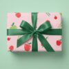 Apple Picking wrapping paper - red and green apples with personalised message on pink