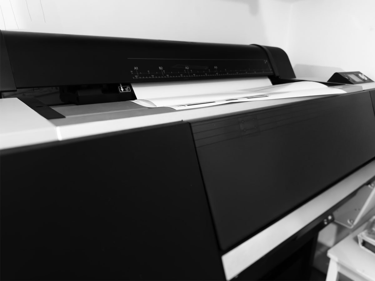 Roll Work studio with Epson printer equipment and wrapping paper production setup